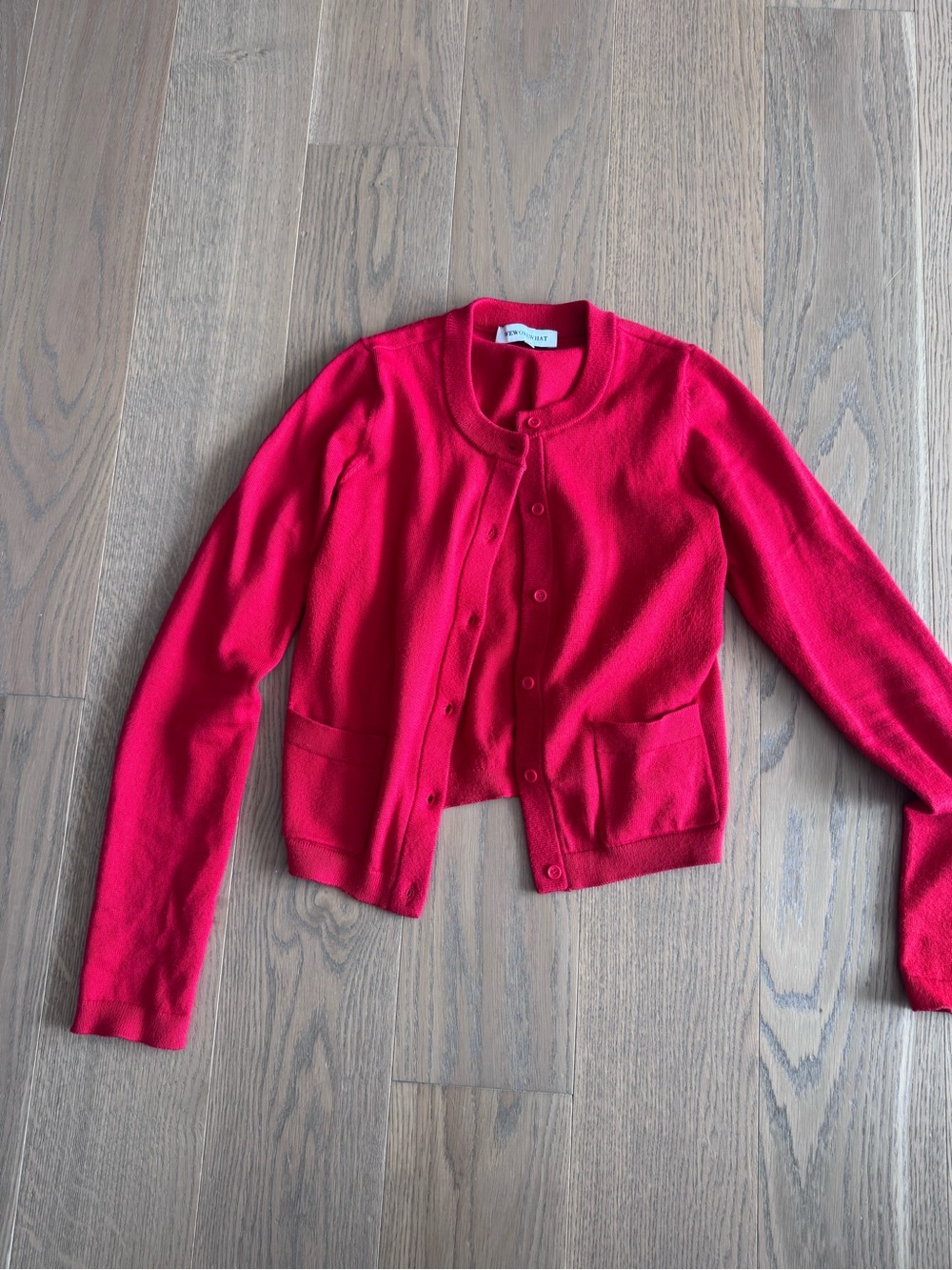Who wore what red cardigan